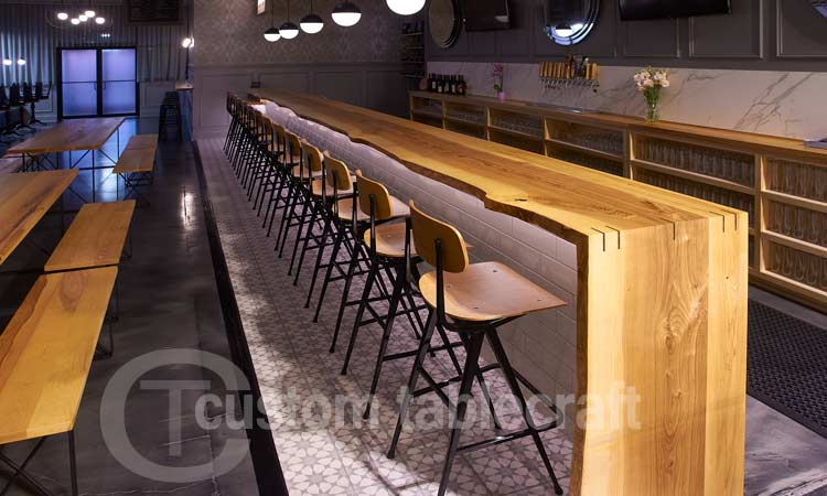 Custom made solid wood bar tops and restaurant table tops for hospitality, office, educational and commercial installations